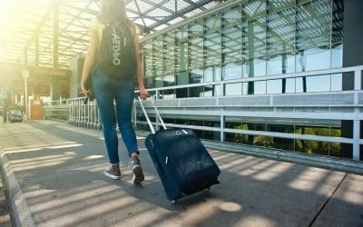 woman walking on pathway while strolling luggage 1008155 2 400x250 - Jaw Pain and TMJ Specialist Brisbane